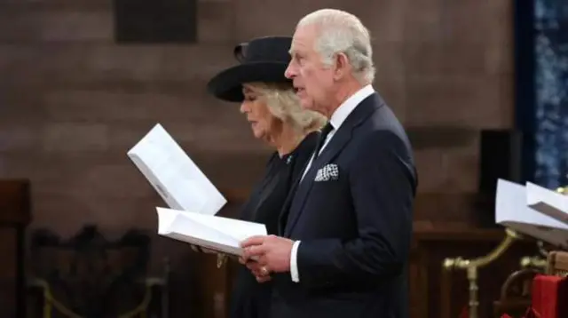 King Charles III and his Queen Consort at the service to remember the Queen