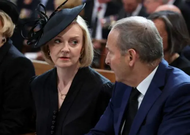 Prime Minister Liz Truss and Taoiseach Micheal Martin take their seats at St Anne's Cathedral