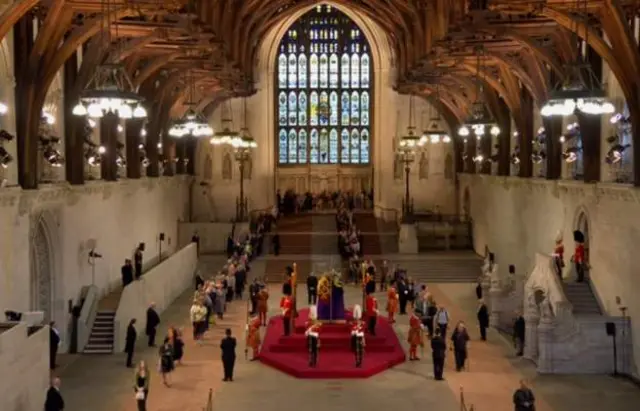 People there have reflected on how quiet it is within the hall, after the hubbub of the line outside and the pomp of the procession