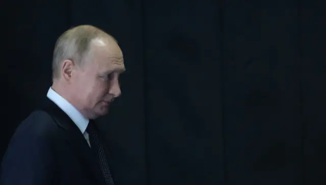 путін