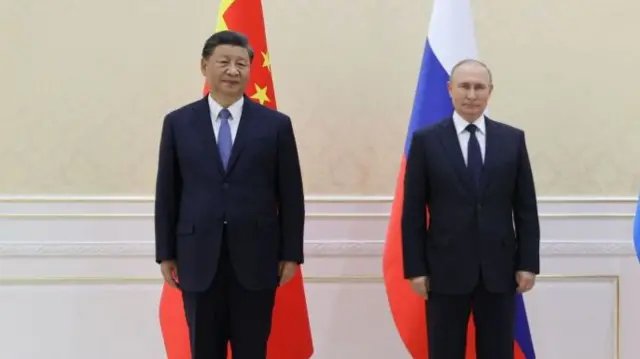 путін