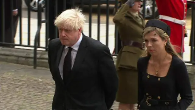 Former prime minister Boris Johnson and his wife Carrie arrive