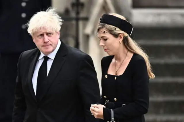 Boris Johnson arrives at Westminster Abbey with his wife Carrie