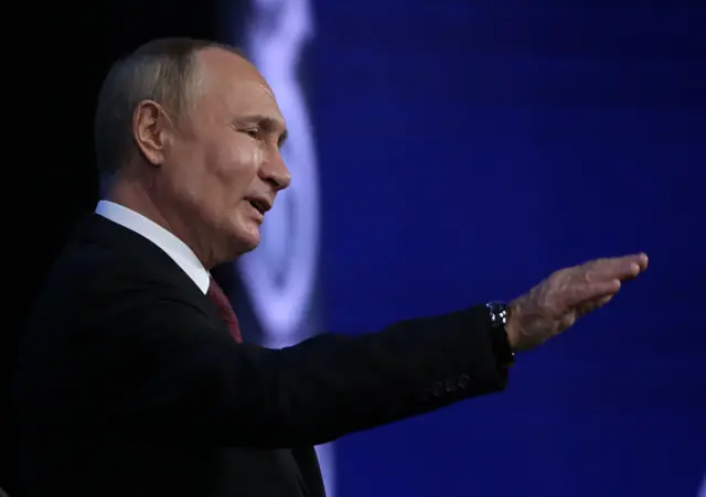 путін