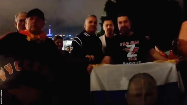 People with Russian flag
