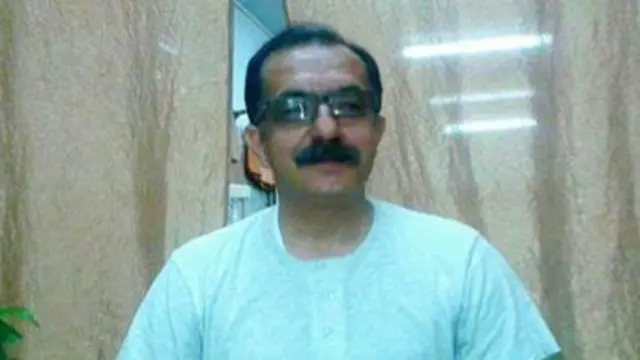 عکسی آرشیوی از محمدعلی منصوری که در وبسایت سازمان های حقوق بشر منتشر شده