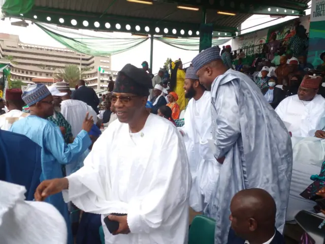 Dignitaries don begin show