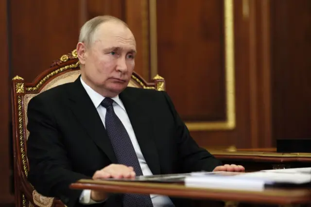 Путин