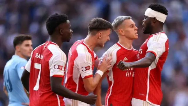 Arsenal players celebrate