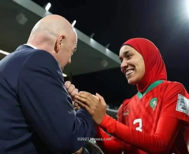 قابل رئيس الاتحاد الدولي لكرة القدم "فيفا" جياني إنفانتينو نهيلة بنزينة