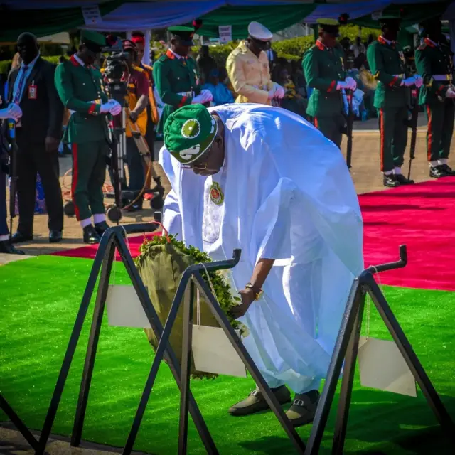 Tinubu laying wreath
