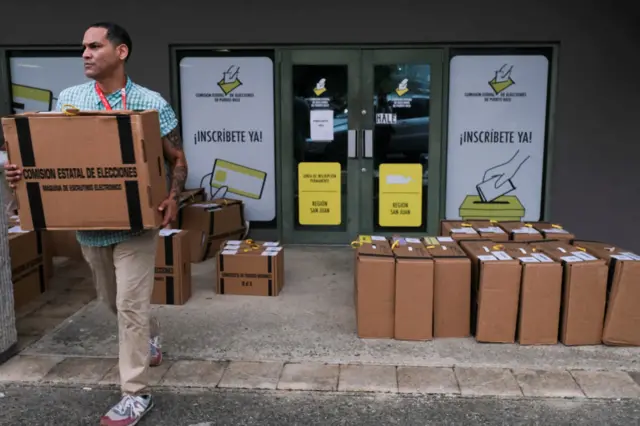 A view of packed ballots and ballot reading machines at the San Juan Electoral Commission headquarters in San Juan, Puerto Rico, November 5, 2024.
