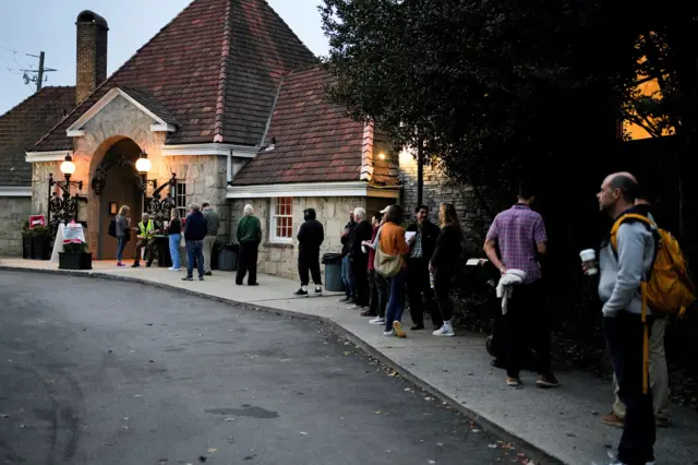 People line up to vote in the 2024 U.S. presidential election on Election Day at Park Tavern in Atlanta, Georgia,