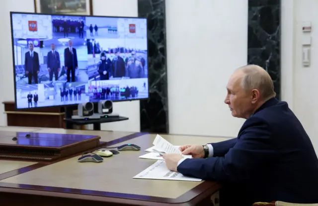 Путин