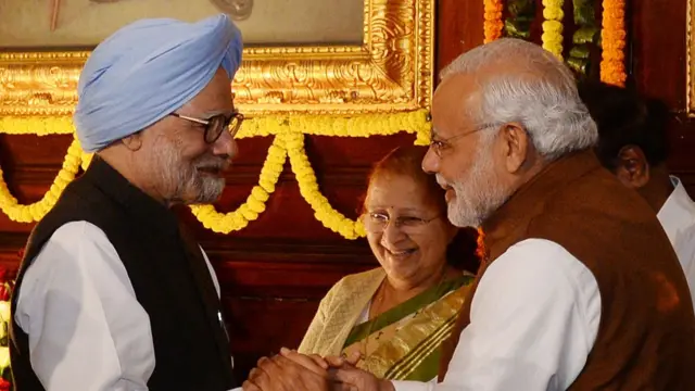 प्रधानमंत्री नरेंद्र मोदी और पूर्व प्रधानमंत्री मनमोहन सिंह