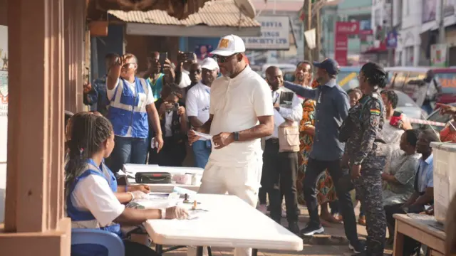 Dr Mathew Opoku Prempeh on white shirt to cast im vote