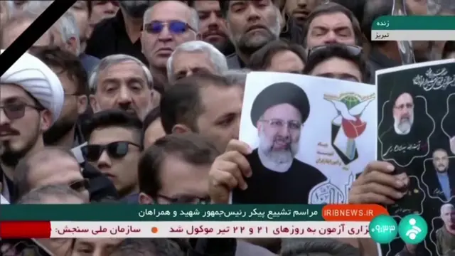 Кадр трансляции похоронной процессии в Тебризе 21 мая 2024 года