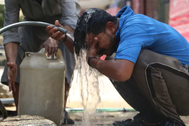 A man tries to cool himself off as temperatures reached 46 to 48 degrees Celsius in Hyderabad, Pakistan on May 24, 2024
