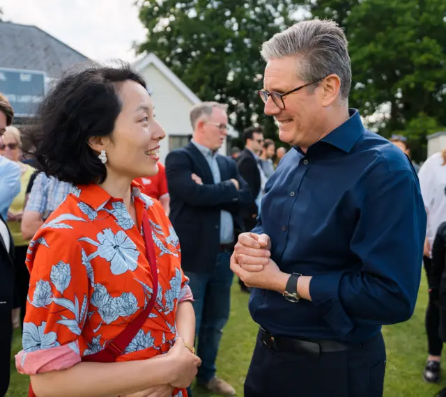 Yang Yuan(left)and Starmer