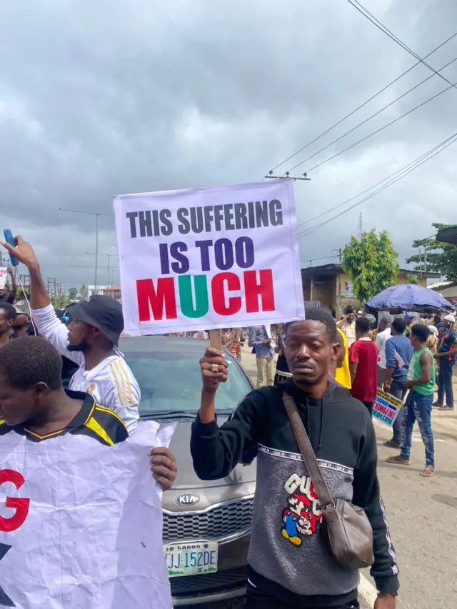 protester hold placard for hand