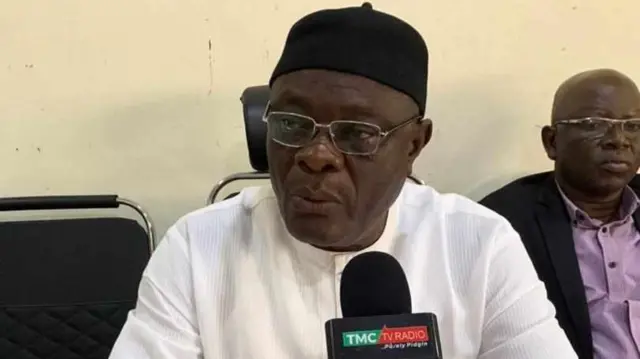 Edo state Inec resident electoral commissioner, Anugbum Onuoha siddon for frot of microphones