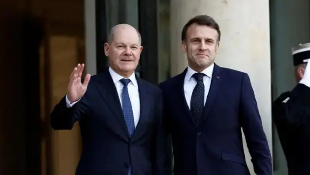 Chancellor mba Jamini bụ Olaf Scholz  na Macron