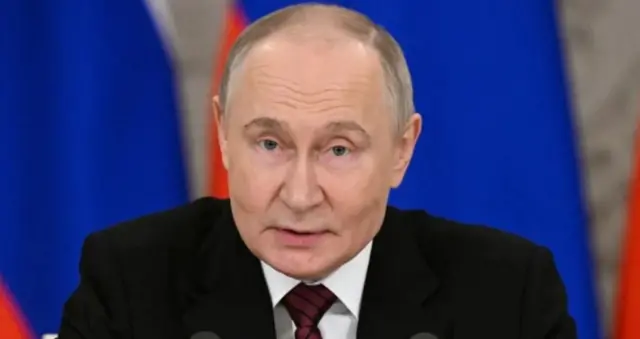 Путин