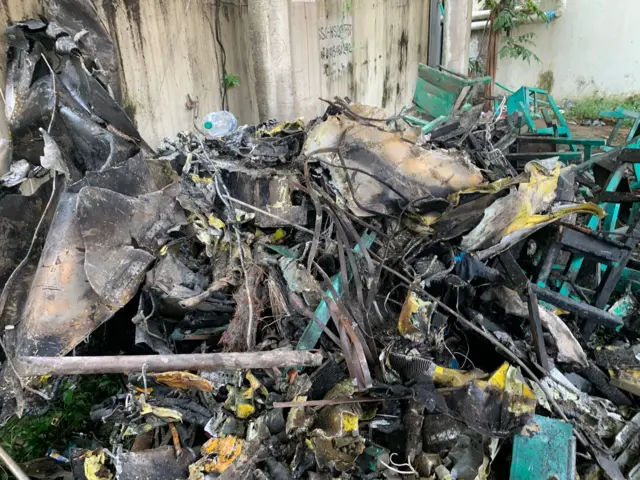 বিধ্বস্ত হওয়ার পর ছিন্নভিন্ন হওয়া প্রশিক্ষণ বিমানের অংশবিশেষ