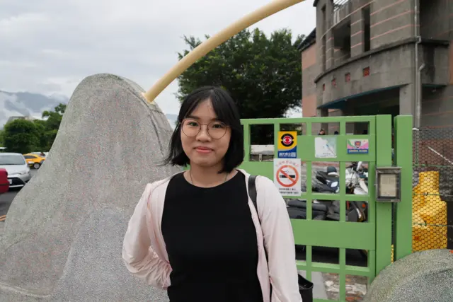 梁小姐