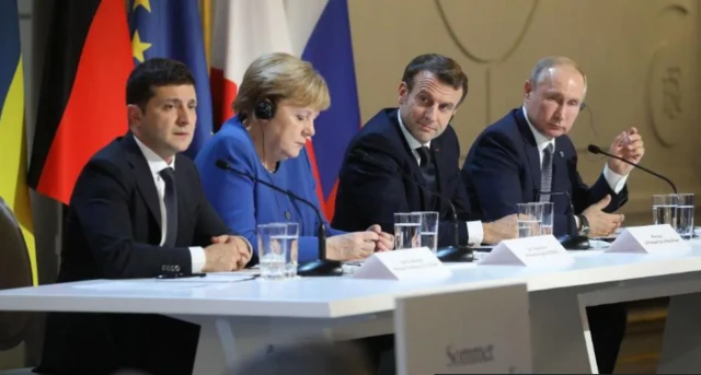 LUDOVIC MARIN/POOL/AFP via Getty Images