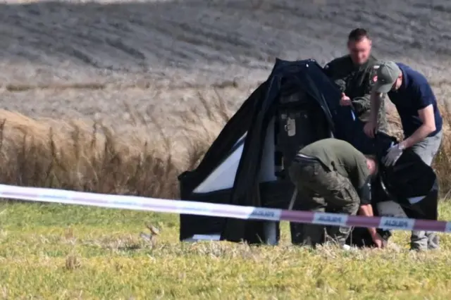 На месте падения российского дрона в деревне Вохынь, на востоке Польши