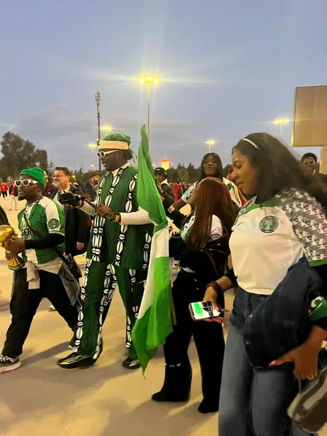 Dem wear Nigeria national green and white colours