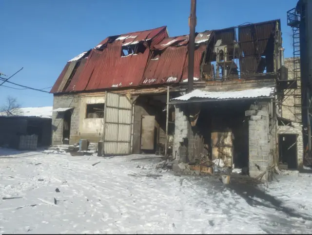 Поврежденный дом в Славянске