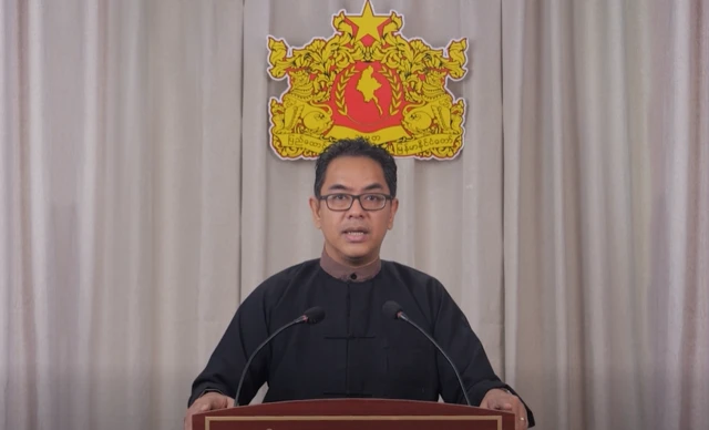 ဇန်နဝါရီ ၆ ရက်က ထုတ်လွှင့်တဲ့ “ပြည်သူလူထုနှင့် နိုင်ငံတကာသို့ သတင်းစကားပြောကြားခြင်း” အစီအစဉ်မှာ မိန့်ခွန်းပြောနေတဲ့ အမျိုးသားညီညွတ်ရေးအစိုးရ၊ ဝန်ကြီးချုပ်ရုံး ပြောရေးဆိုခွင့်ရှိသူ ဦးနေဘုန်းလတ်