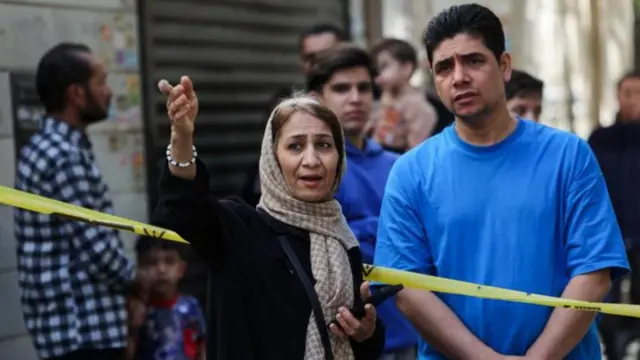 ጥቃት በተፈጸመበት ቦታ የተገኙ ነዋሪዎች