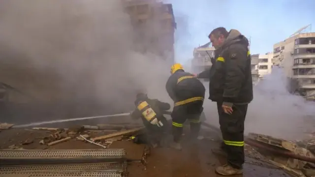 Firefighters in Beirut were also pictured putting out a fire in a residential area