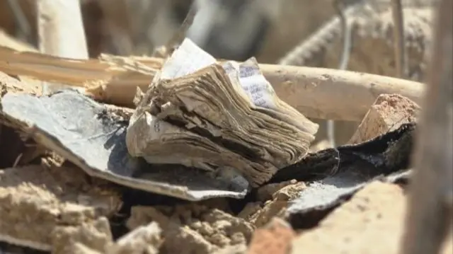 کتب مذهبی آسیب دیده زیر آوار