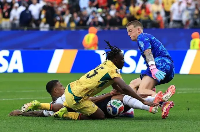 Prince Adu #25 of Ghana is challenged by Ezri Konsa #2 of England in the penalty box