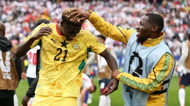 Kojo Peprah Oppong #21 and Augustine Boakye #20 of Ghana celebrate after the scoreless draw in the FIFA World Cup 2026 Group L match between England and Ghana at Boston Stadium on June 23, 2026 in Foxborough, Massachusetts