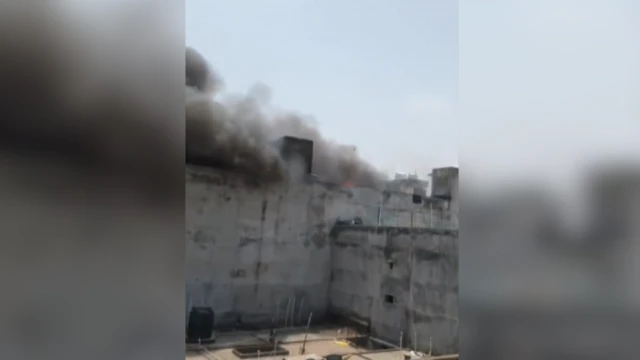 आग़ के बाद उठता धुंआ