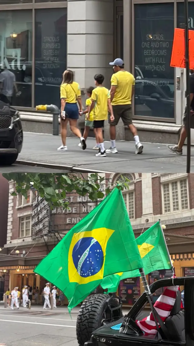 Bandeiras do Brasil e pessoas com roupas da seleção em Nova York