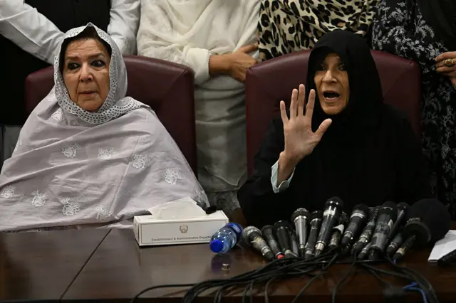 Pakistan's former prime minister Imran Khan's sisters Uzma Khan (R) and Rubina Khan