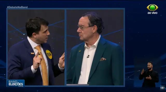 Renan Santos e Augusto Cury no debate da Band
