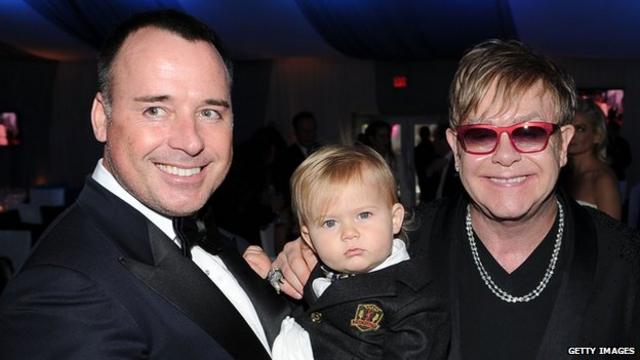 Elton John, David Furnish and their son