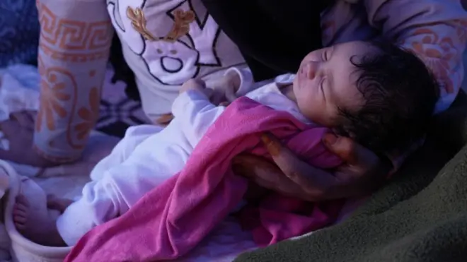 A close up of a baby