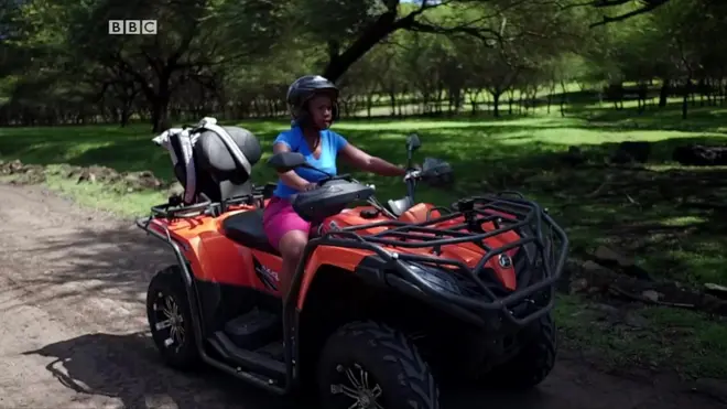 BBC reporter on a quad bike