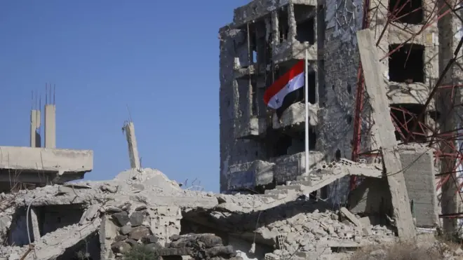 Офіційний прапор Сирії підняли в частині міста Дараа, яку кілька років контролювали повстанці
