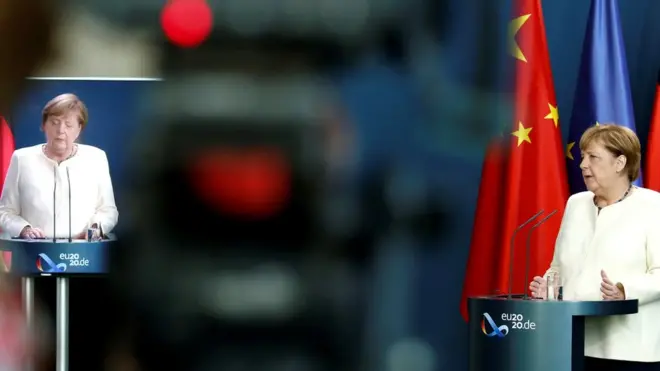 German Chancellor Angela Merkel holds a video news conference with European Council President Charles Michel and European Commission President Ursula von der Leyen following a virtual summit with China"s President Xi Jinping, at the Chancellery in Berlin, September 14, 2020.