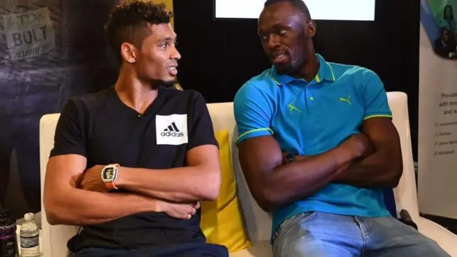 Wayde van Niekerk(kushoto) Usain Bolt(kulia)