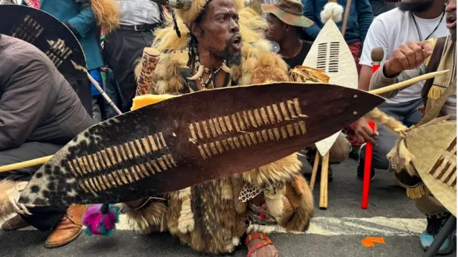 One man wear South African attire